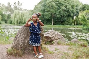 Cute african american baby girl at sunglasses photo