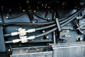 Elements of agricultural combine close up view photo