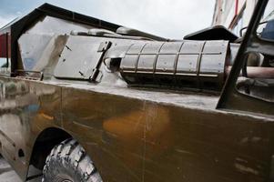 Close up exhaust on armored military car. photo