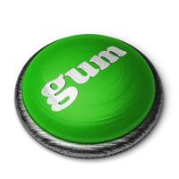 gum word on green button isolated on white photo