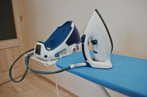 Ironing board with steam iron system photo