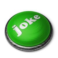 joke word on green button isolated on white photo
