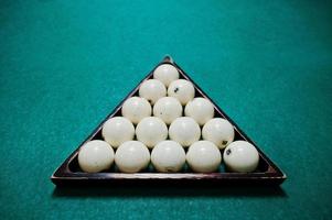 The russian billiards balls in triangle photo