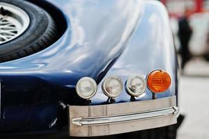 Rear headlights of old classic car photo