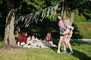 Two sexy girls at short shorts posed and having fun on bachelorette party photo