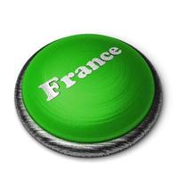 Palabra de Francia en el botón verde aislado en blanco foto