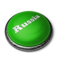 Palabra de Rusia en el botón verde aislado en blanco foto
