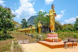 Monk In the line Statue in myanmar country side photo