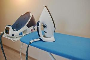 Ironing board with steam iron system photo