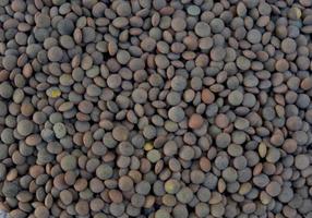 A few raw brown lentils photo