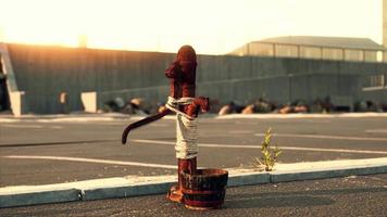 old rusty water pump at sunny day video