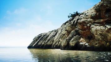 beautiful rocky cliff in the middle of the sea video