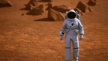 Astronaut on Mars Surface. Red Planet Covered in Gas and rock video