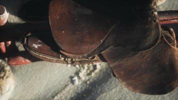 Rider Leather Saddle on fence in desert video