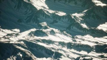 Aerial view of the Alps mountains in snow video