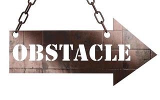 obstacle word on metal pointer photo