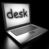 desk word on laptop photo