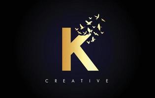 Golden K Logo Letter with Flock of Birds Flying and Disintegrating from the Letter. vector