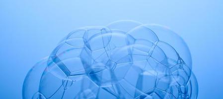 Soap bubbles on a blue background. Abstract photo. photo