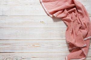 top view tablecloth on wooden table background photo