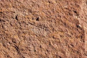 Cracked and abstract grunge texture. Aged material surface backdrop. Weathered effect pattern. Old and dirty background. photo