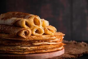 Traditional Russian food - thin pancakes. photo