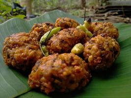 lento food from Indonesia. banana leaf background. close up shot outdoors. photo