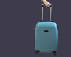 Blue Stylish Suitcase Isolated on Purple Background. Luxurious Blue Plastic Suitcase. Concept of Travel, Vacation, Business Travel. photo