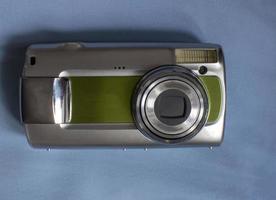 Vintage Retro Cameras With Copy Space on a Blue Background. photo
