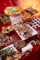 welcome buffet with alcohol and snacks photo