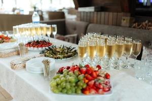 welcome buffet with alcohol and snacks photo