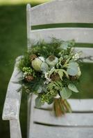 elegant wedding bouquet of fresh natural flowers photo