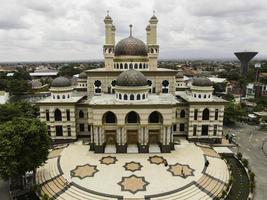 Aerial view of the mosque in Klaten, Indonesia starting from the Door. Klaten, Indonesia - December 2020 photo