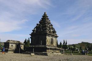 Local tourists visit Arjuna temple complex at Dieng Plateau. photo