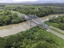 Aerial View of Train Bridge above Progo River in Yogyakarta, Indonesia. photo