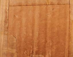 Grunge brown cardboard background photo