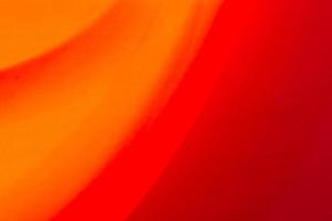 Red orange abstract gradient background with waves photo