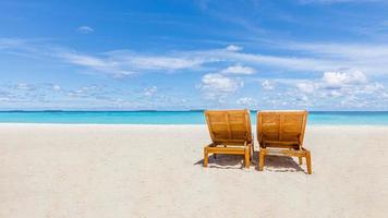 Chaise lounge on beach. Beautiful beach. Chairs on the sandy beach near the sea. Summer holiday and vacation concept for tourism. Inspirational tropical landscape