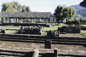 Local tourists visit Arjuna temple complex at Dieng Plateau. photo