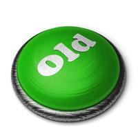 palabra antigua en el botón verde aislado en blanco foto
