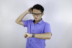 Being late to work and deadline, Young asian man is time delay and late on project. Executive angry, hurry, stress, frustrated and unsatisfied worker man lateness to office. photo