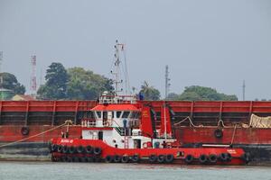 Various ship activities at the Port of Sri Bintan Pura in the city of Tanjung Pinang namely on the west coast of the island of Bintan photo