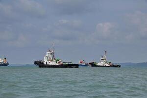 Various ship activities at the Port of Sri Bintan Pura in the city of Tanjung Pinang namely on the west coast of the island of Bintan photo