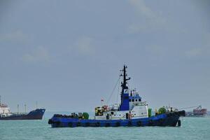 Various ship activities at the Port of Sri Bintan Pura in the city of Tanjung Pinang namely on the west coast of the island of Bintan photo