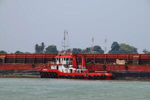 Various ship activities at the Port of Sri Bintan Pura in the city of Tanjung Pinang namely on the west coast of the island of Bintan photo