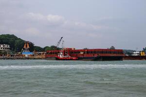 Various ship activities at the Port of Sri Bintan Pura in the city of Tanjung Pinang namely on the west coast of the island of Bintan photo