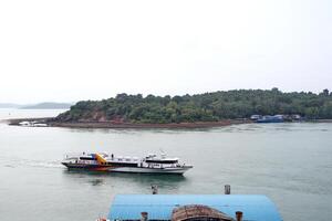 Various ship activities at the Port of Sri Bintan Pura in the city of Tanjung Pinang namely on the west coast of the island of Bintan photo