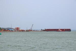 Various ship activities at the Port of Sri Bintan Pura in the city of Tanjung Pinang namely on the west coast of the island of Bintan photo