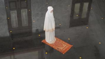 Asian Muslim woman praying alone without imam in mosque photo