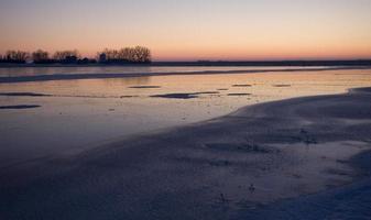 Sunset on Frozen Lake photo